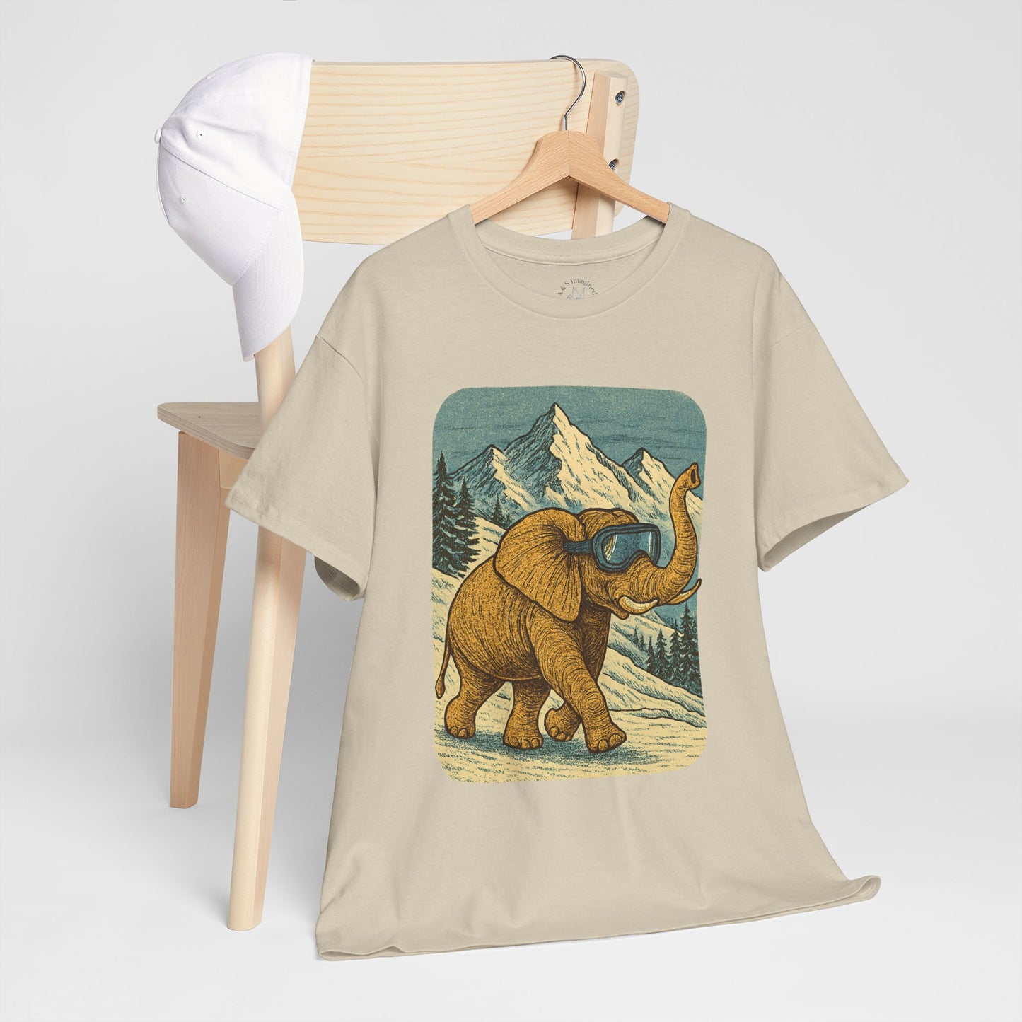 Elephant in Snowy Mountains Tee | Vintage Winter Animal Shirt | Cozy Nature Graphic T-Shirt | Retro Wildlife Illustration | Unisex Elephant Tee