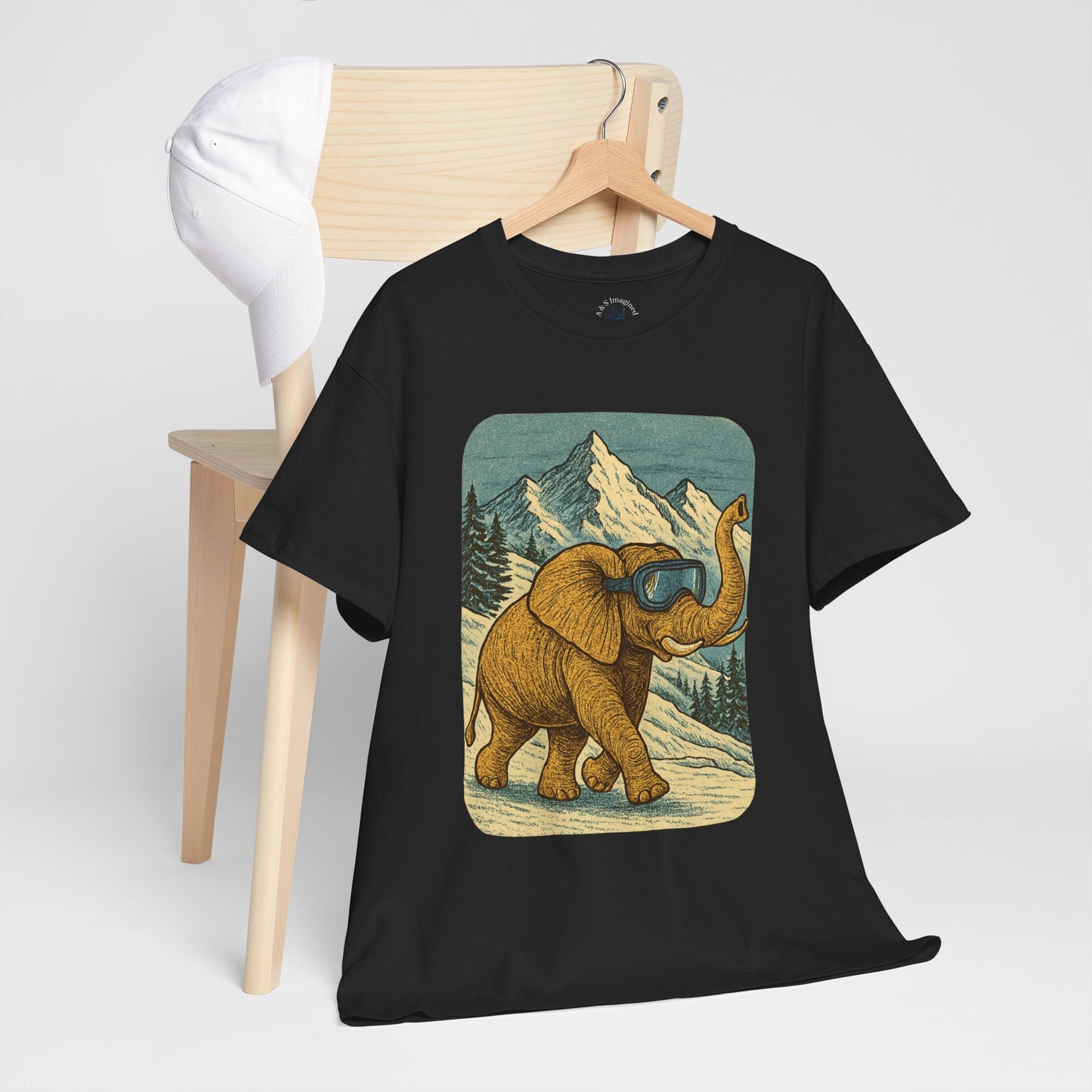 Elephant in Snowy Mountains Tee | Vintage Winter Animal Shirt | Cozy Nature Graphic T-Shirt | Retro Wildlife Illustration | Unisex Elephant Tee
