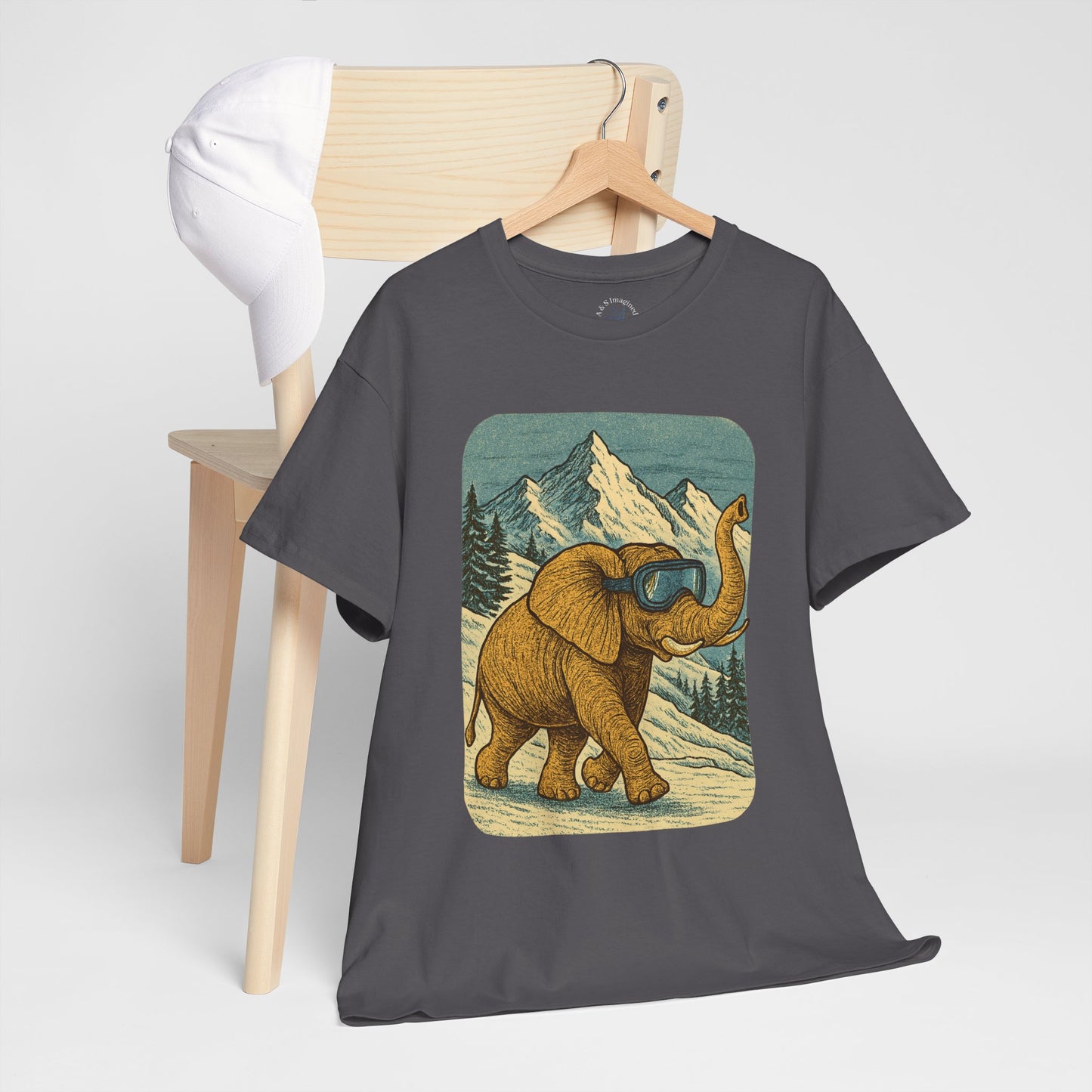 Elephant in Snowy Mountains Tee | Vintage Winter Animal Shirt | Cozy Nature Graphic T-Shirt | Retro Wildlife Illustration | Unisex Elephant Tee