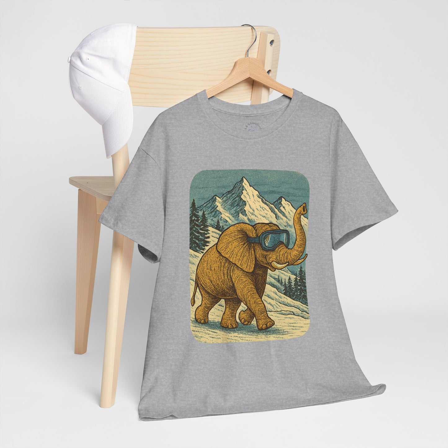 Elephant in Snowy Mountains Tee | Vintage Winter Animal Shirt | Cozy Nature Graphic T-Shirt | Retro Wildlife Illustration | Unisex Elephant Tee